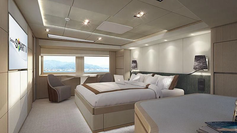 a room with a bed and a chair aboard GOLD STAR Yacht for Charter