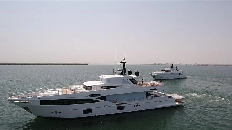 a couple of boats in the water aboard GOLD STAR Yacht for Charter