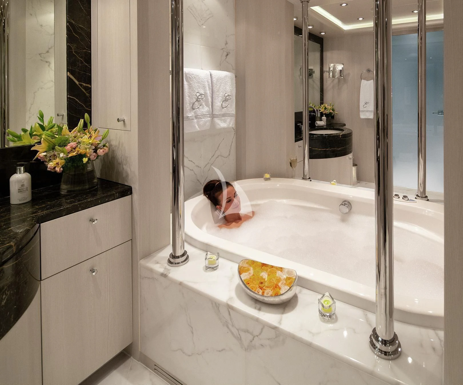 a person sitting in a bathtub aboard ETERNITY Yacht for Sale