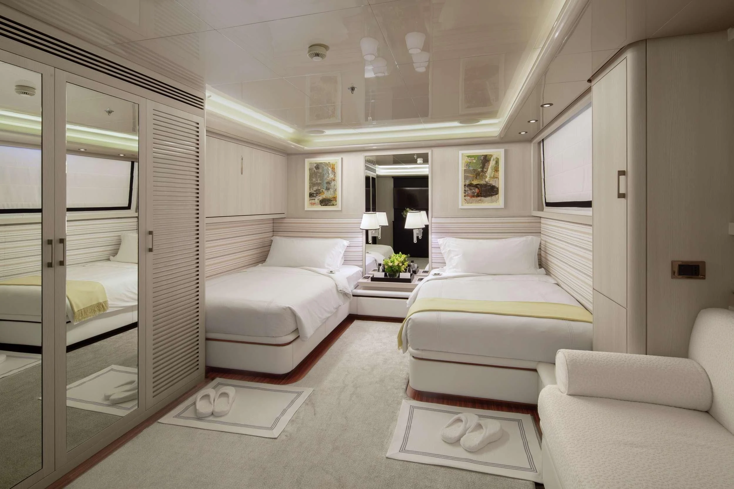 a room with a bed and a couch aboard ETERNITY Yacht for Sale