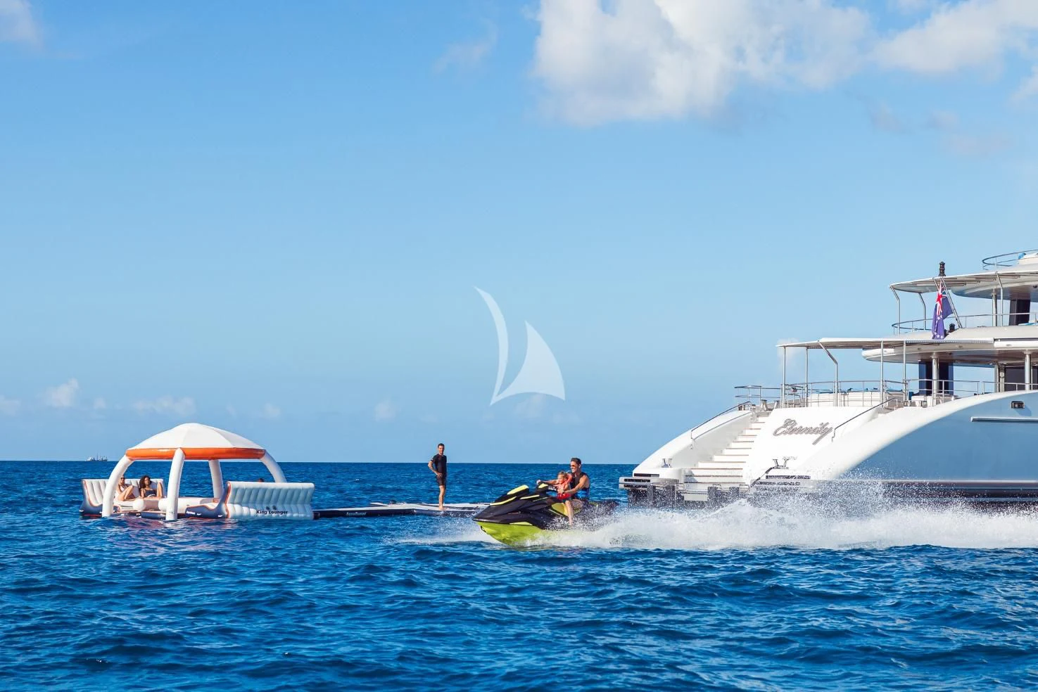 a person on a jet ski in the water aboard ETERNITY Yacht for Sale