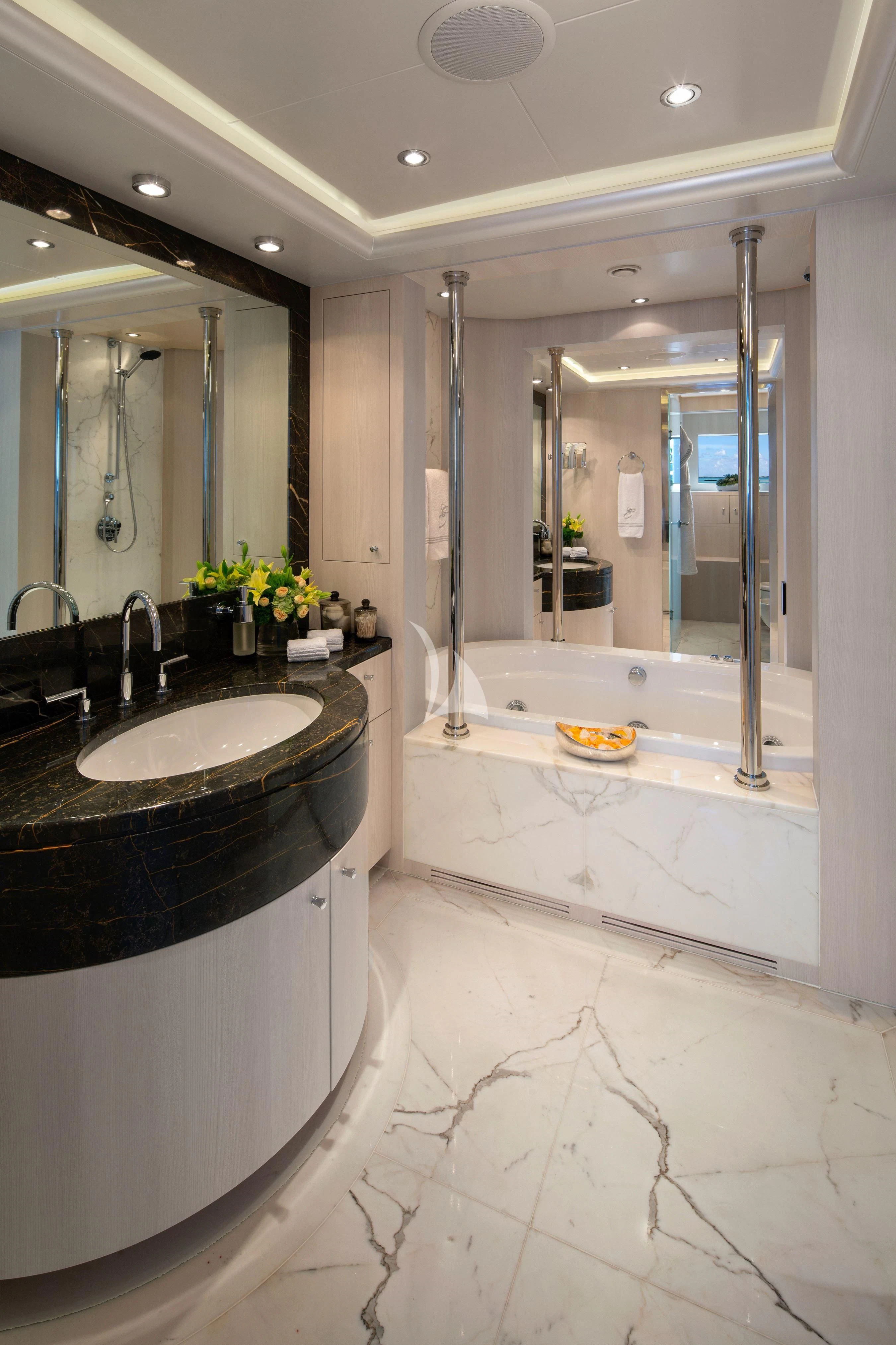 a bathroom with a tub sink and a shower aboard ETERNITY Yacht for Sale