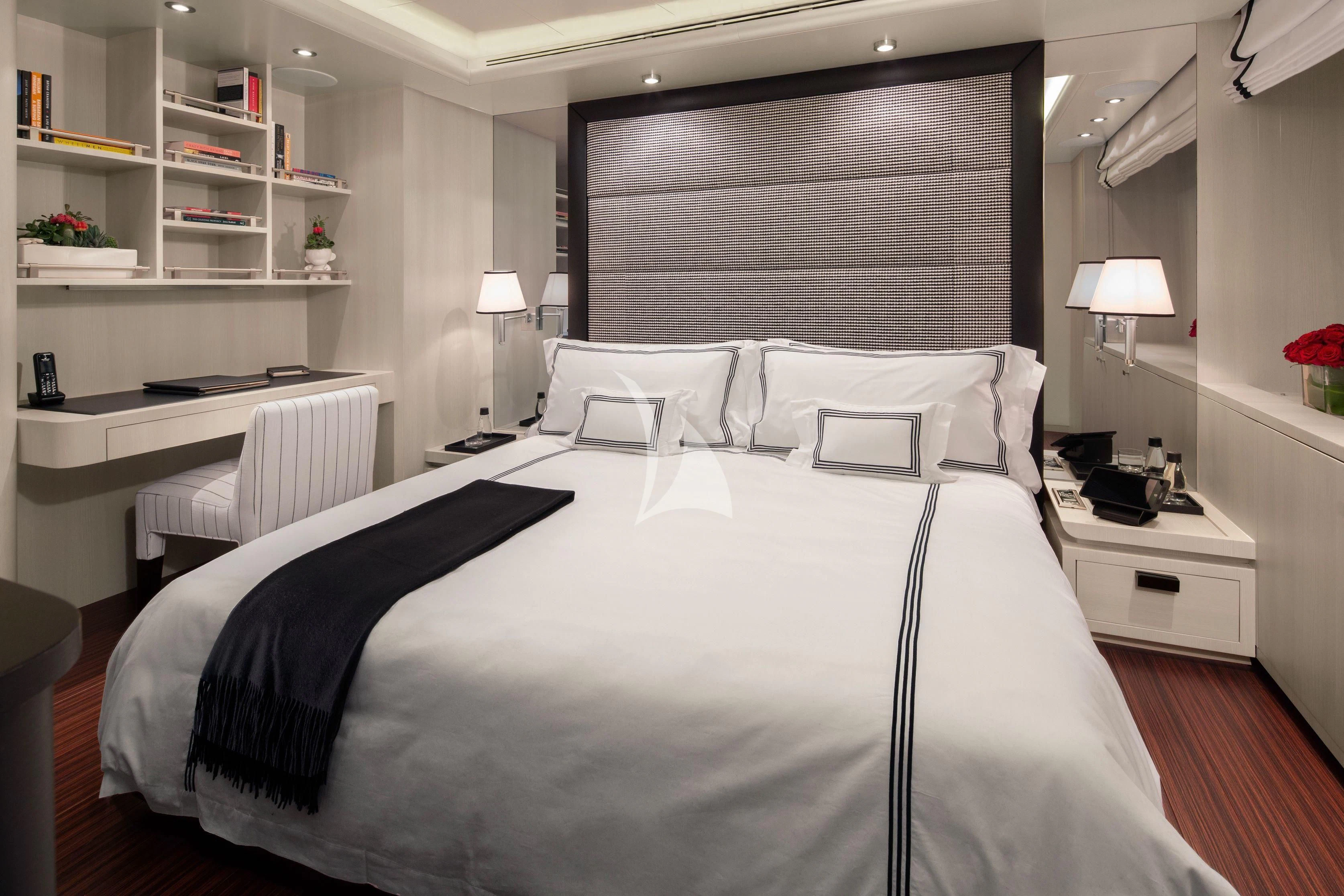 a bed with white sheets aboard ETERNITY Yacht for Sale