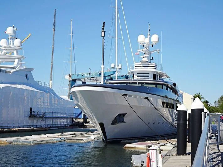 a large white boat docked aboard ETERNITY Yacht for Sale