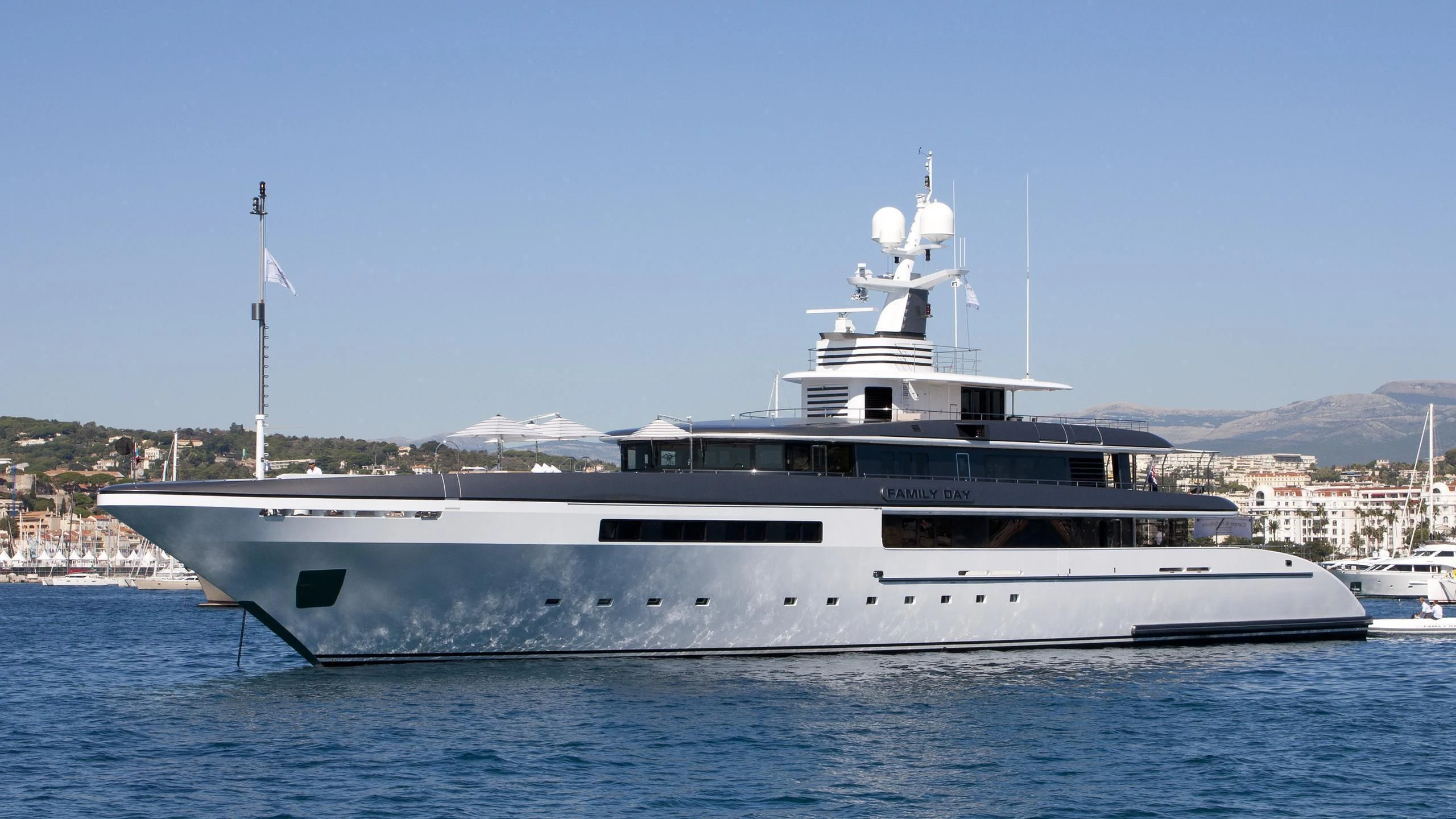 a large white boat in the water aboard ETERNITY Yacht for Sale
