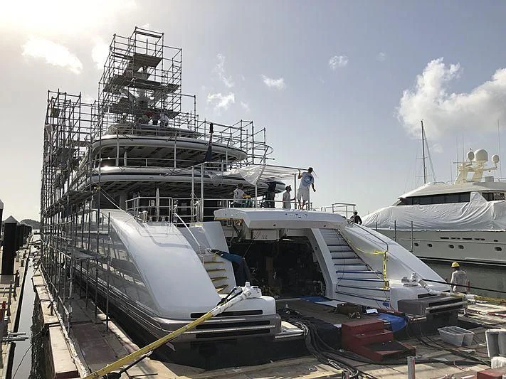 a large ship docked at a port aboard ETERNITY Yacht for Sale