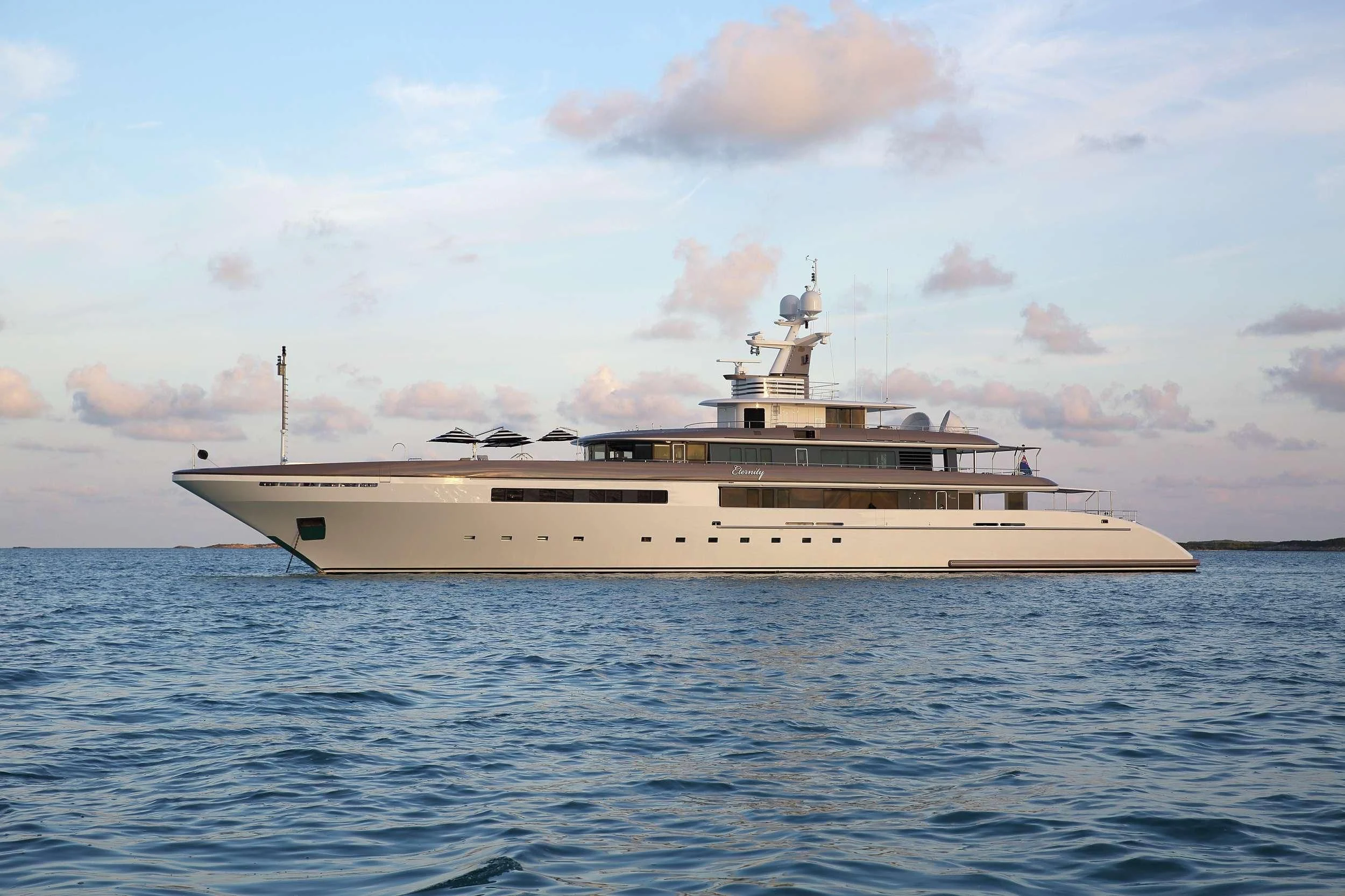 a large ship in the water aboard ETERNITY Yacht for Sale