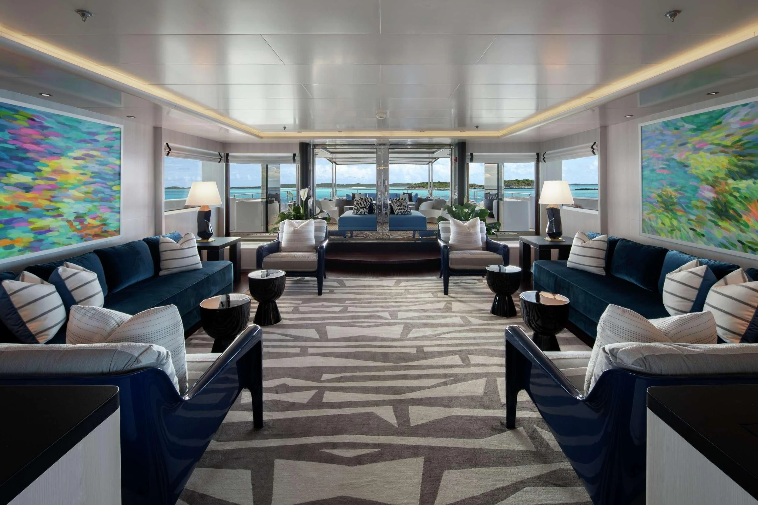 a large living room with a large window aboard ETERNITY Yacht for Sale