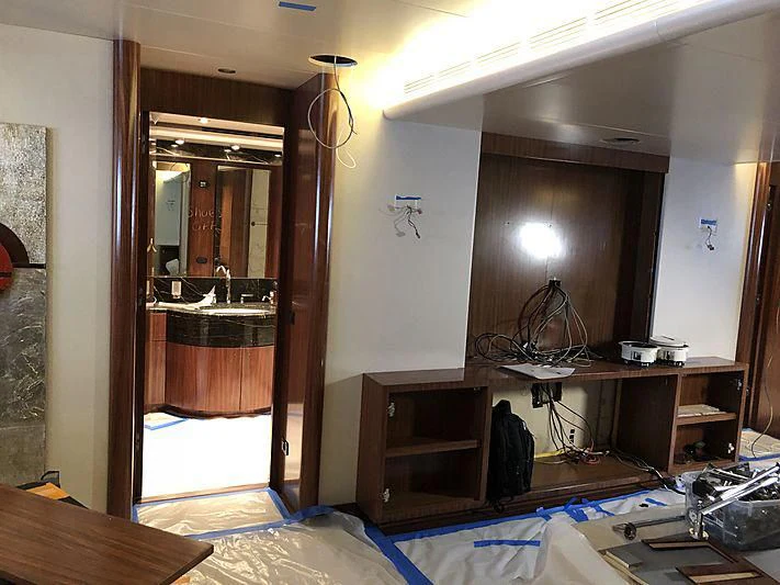 a room with a mirror and a desk aboard ETERNITY Yacht for Sale