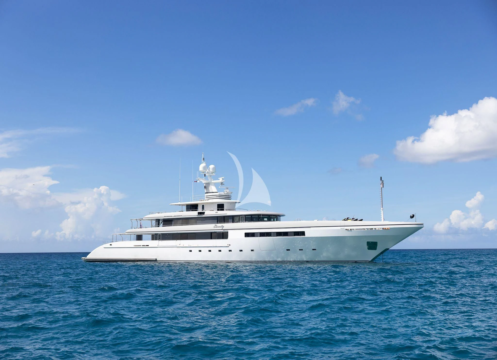 a white boat in the water aboard ETERNITY Yacht for Sale