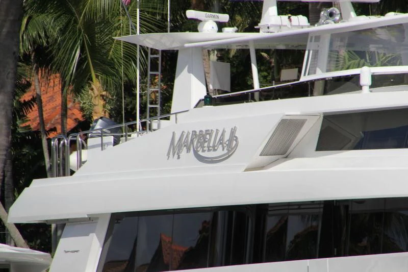 a white building with a sign on it aboard MARBELLA II Yacht for Sale