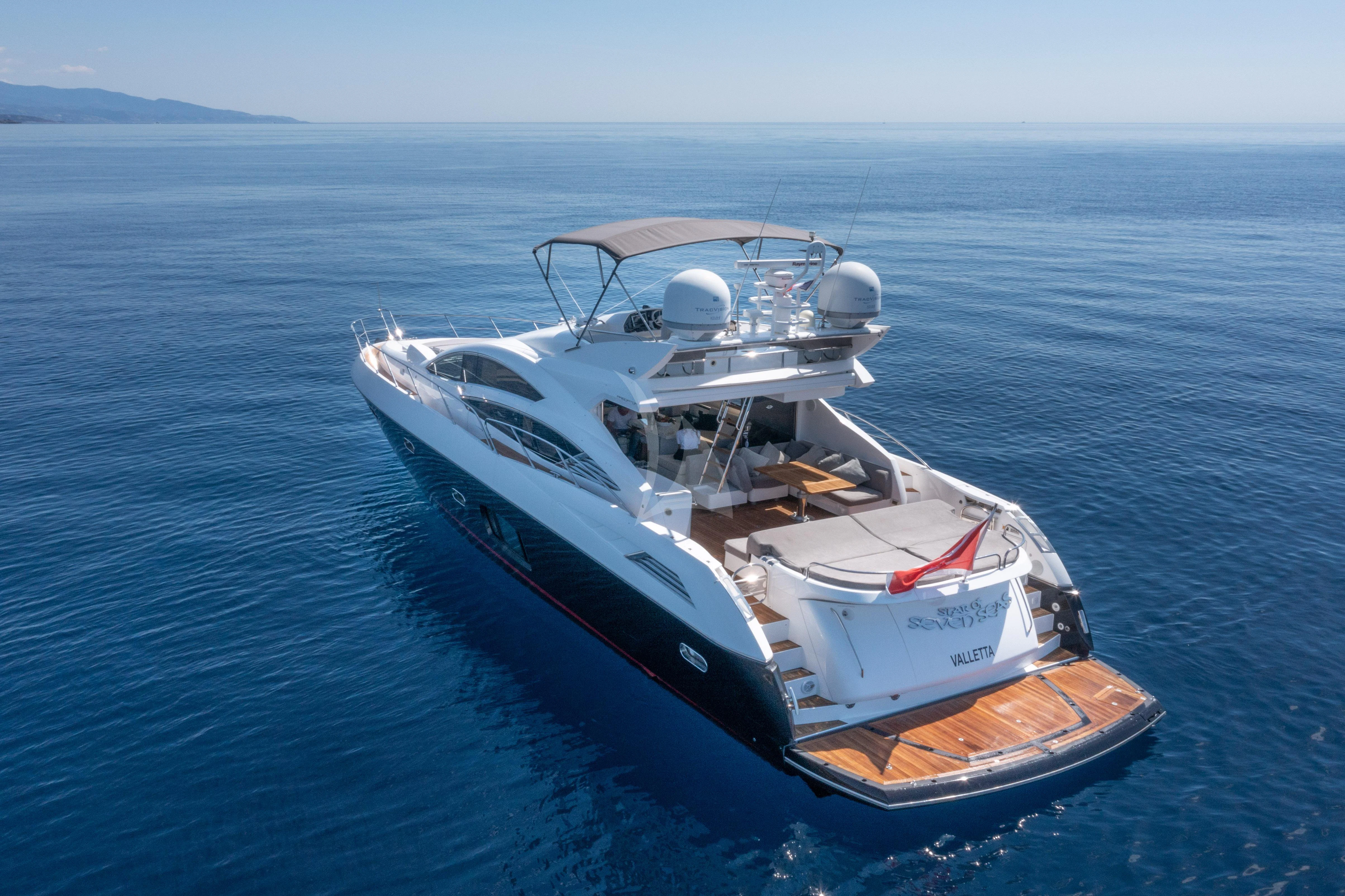 a boat on the water aboard STAR OF SEVEN SEAS Yacht for Sale