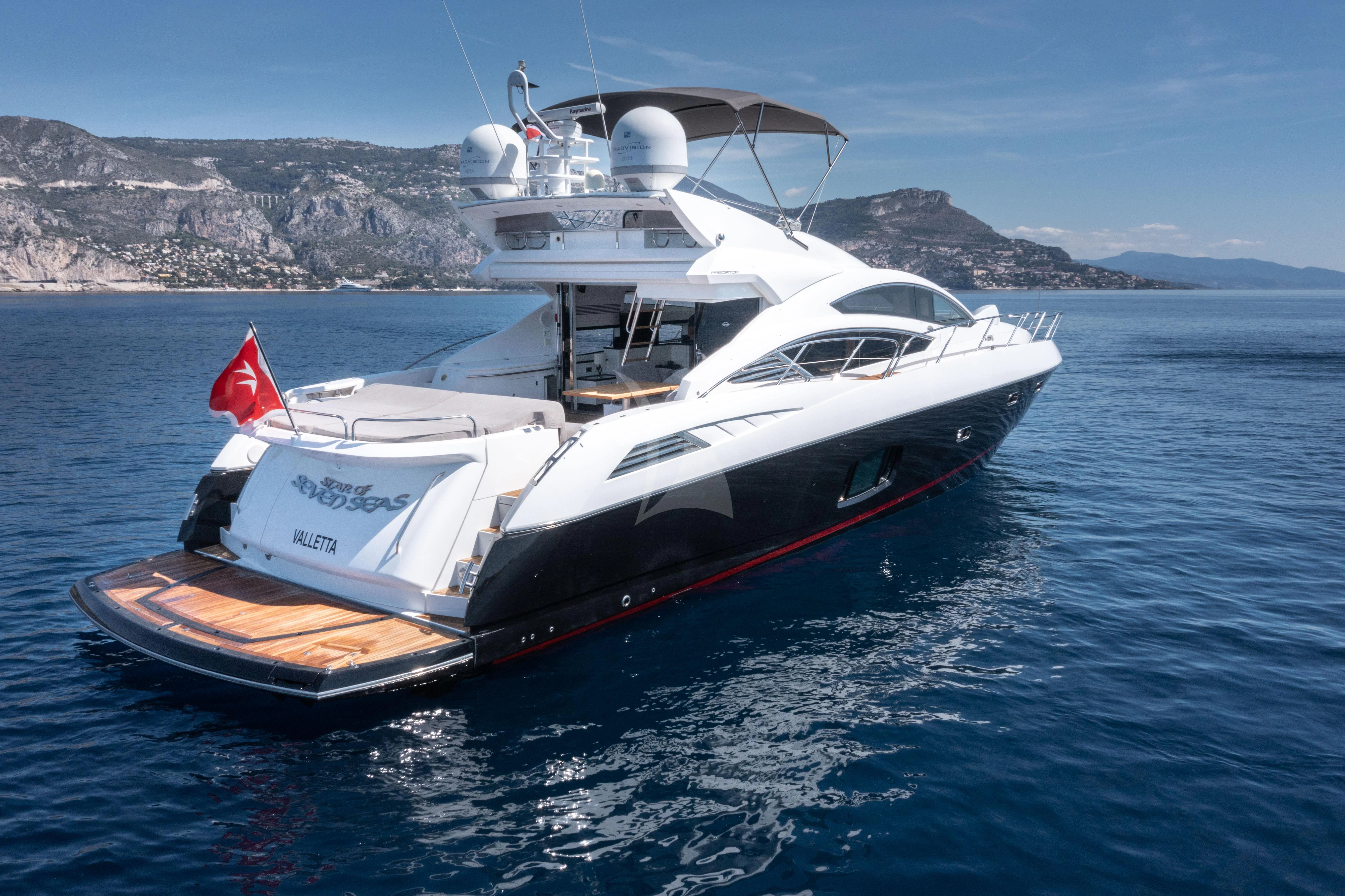 a boat on the water aboard STAR OF SEVEN SEAS Yacht for Sale