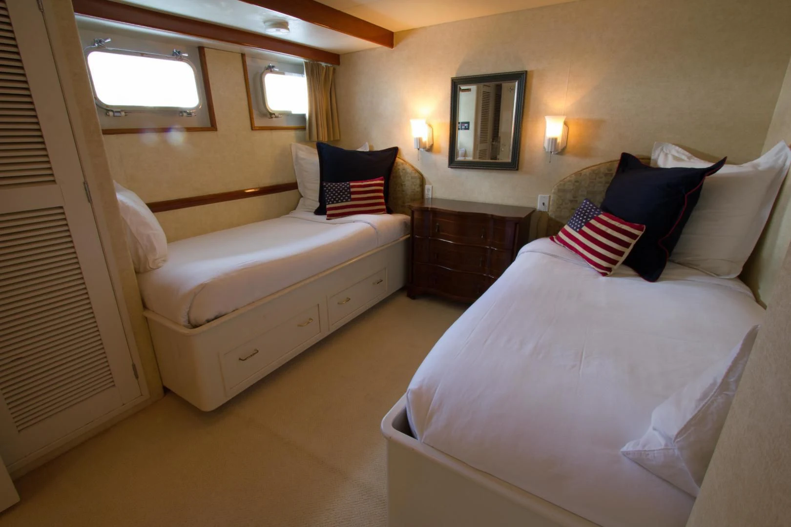a room with a bed and a couch aboard SEA CZAR Yacht for Sale