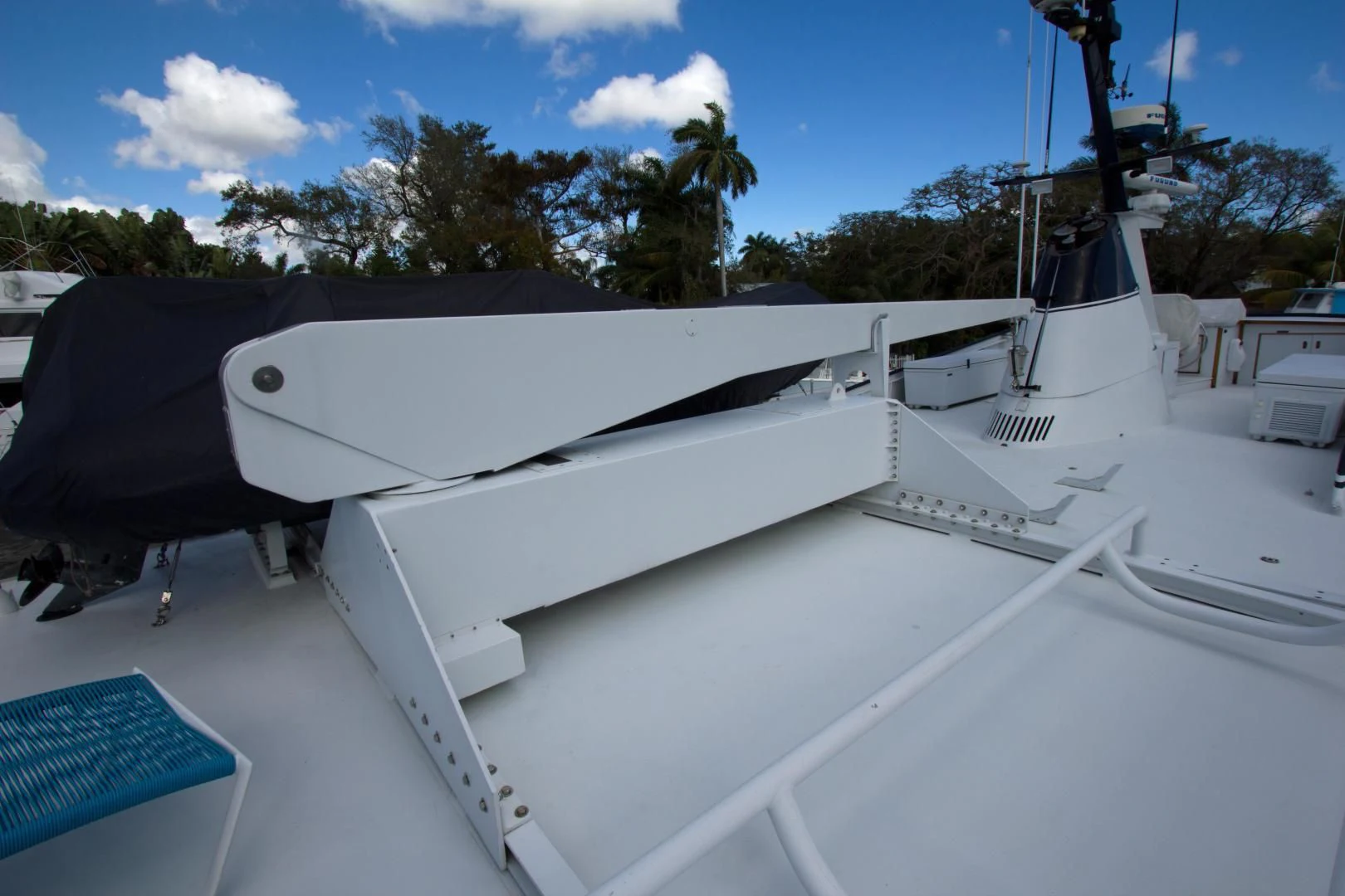 a white boat on a deck aboard SEA CZAR Yacht for Sale