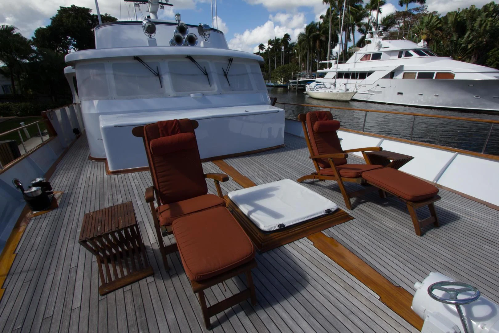 a table and chairs on a boat aboard SEA CZAR Yacht for Sale