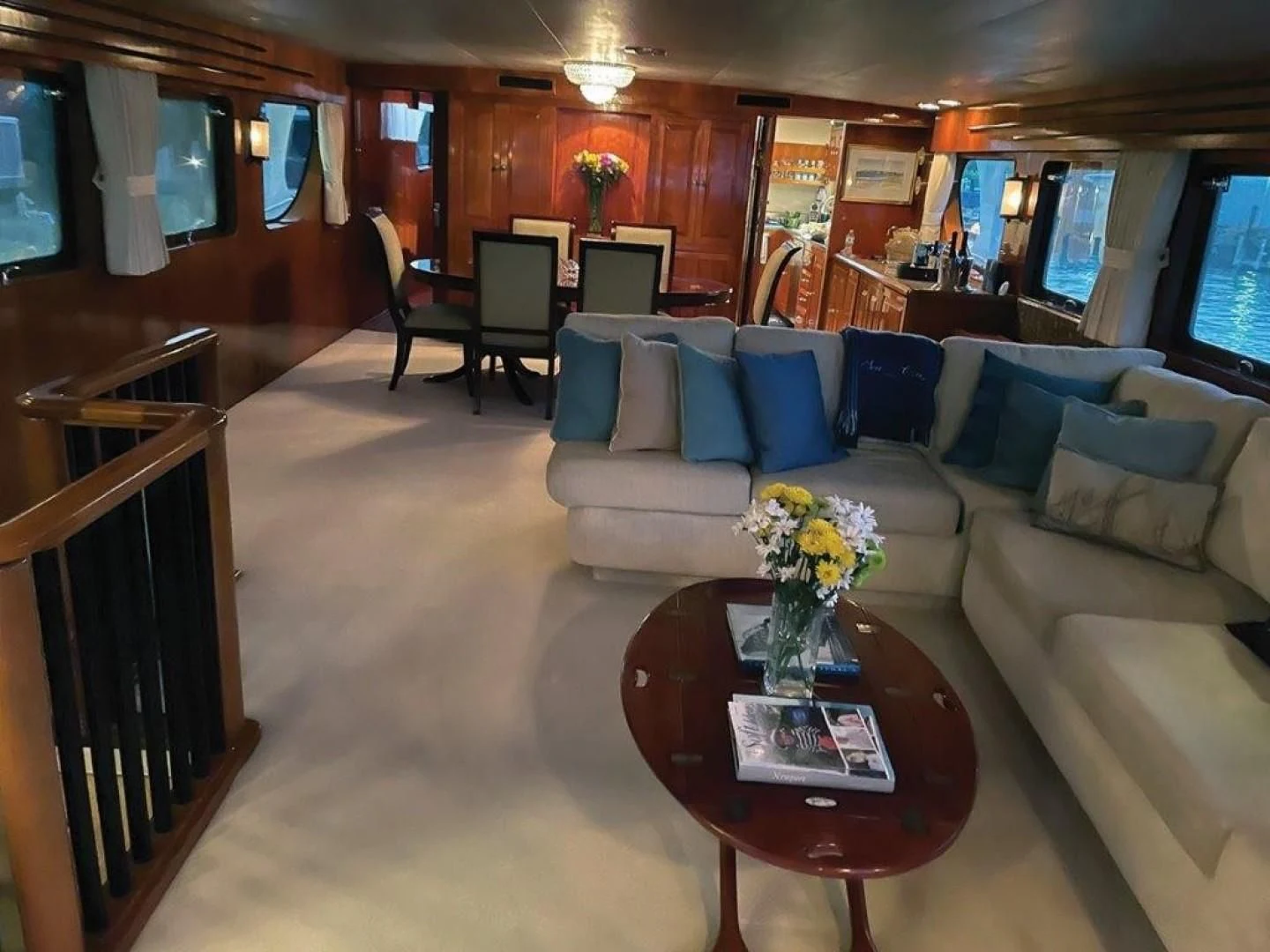 a living room with a couch and a coffee table aboard SEA CZAR Yacht for Sale