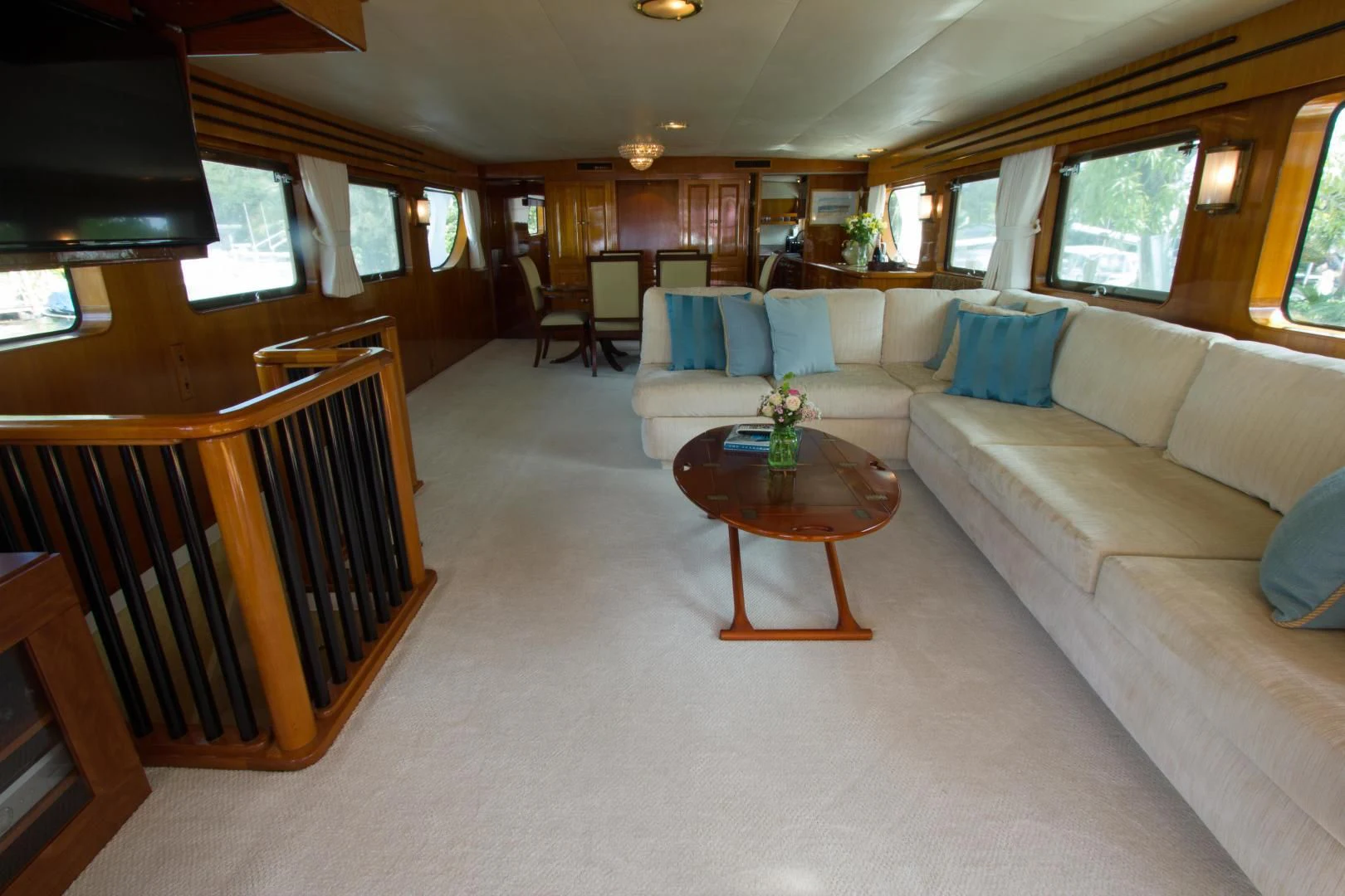 a living room with a couch and a coffee table aboard SEA CZAR Yacht for Sale