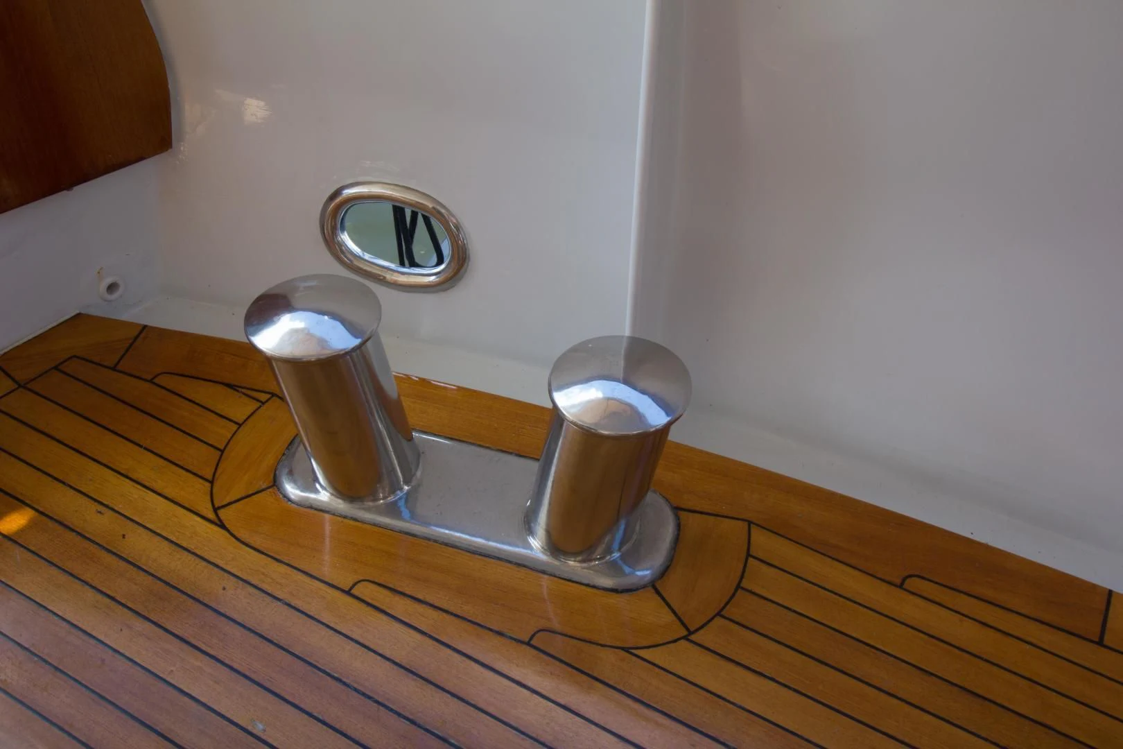 a couple of candles on a wood table aboard SEA CZAR Yacht for Sale