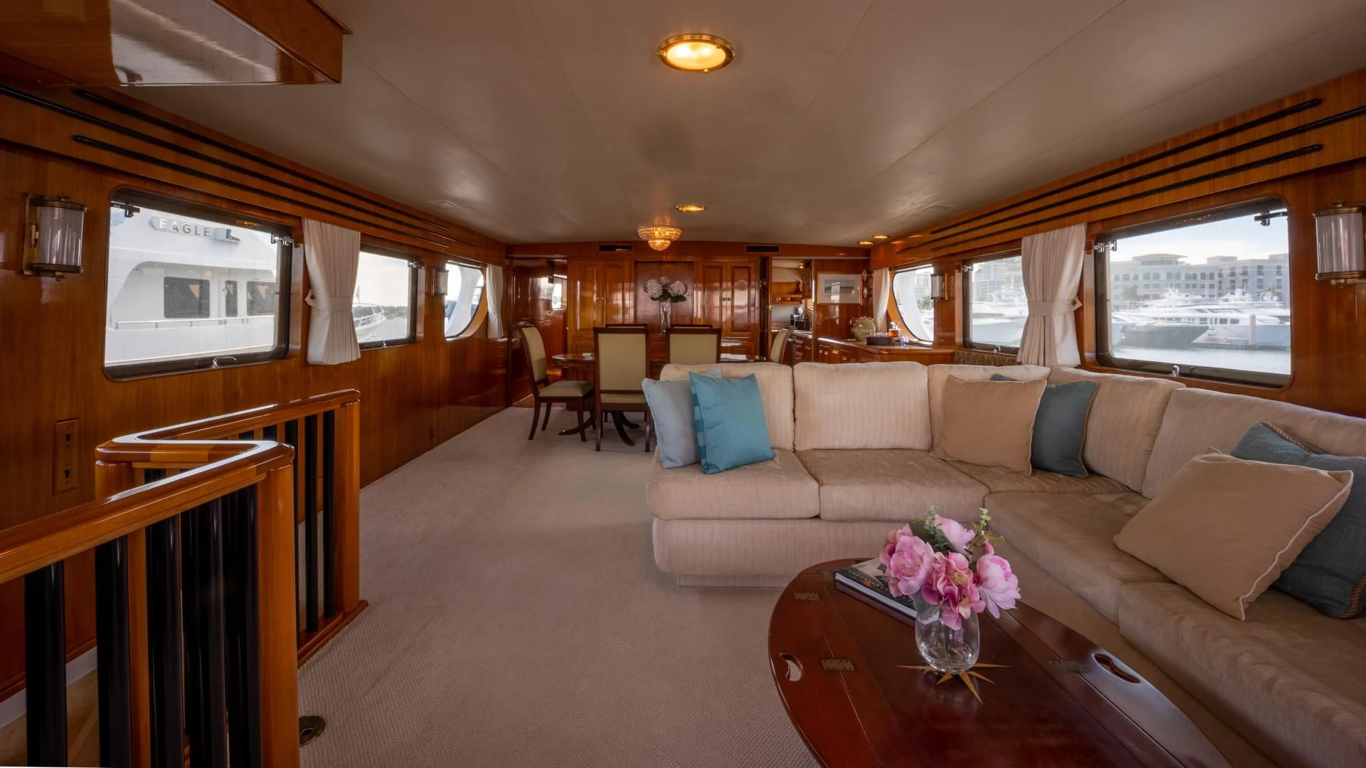 a living room with a couch and a coffee table aboard SEA CZAR Yacht for Sale