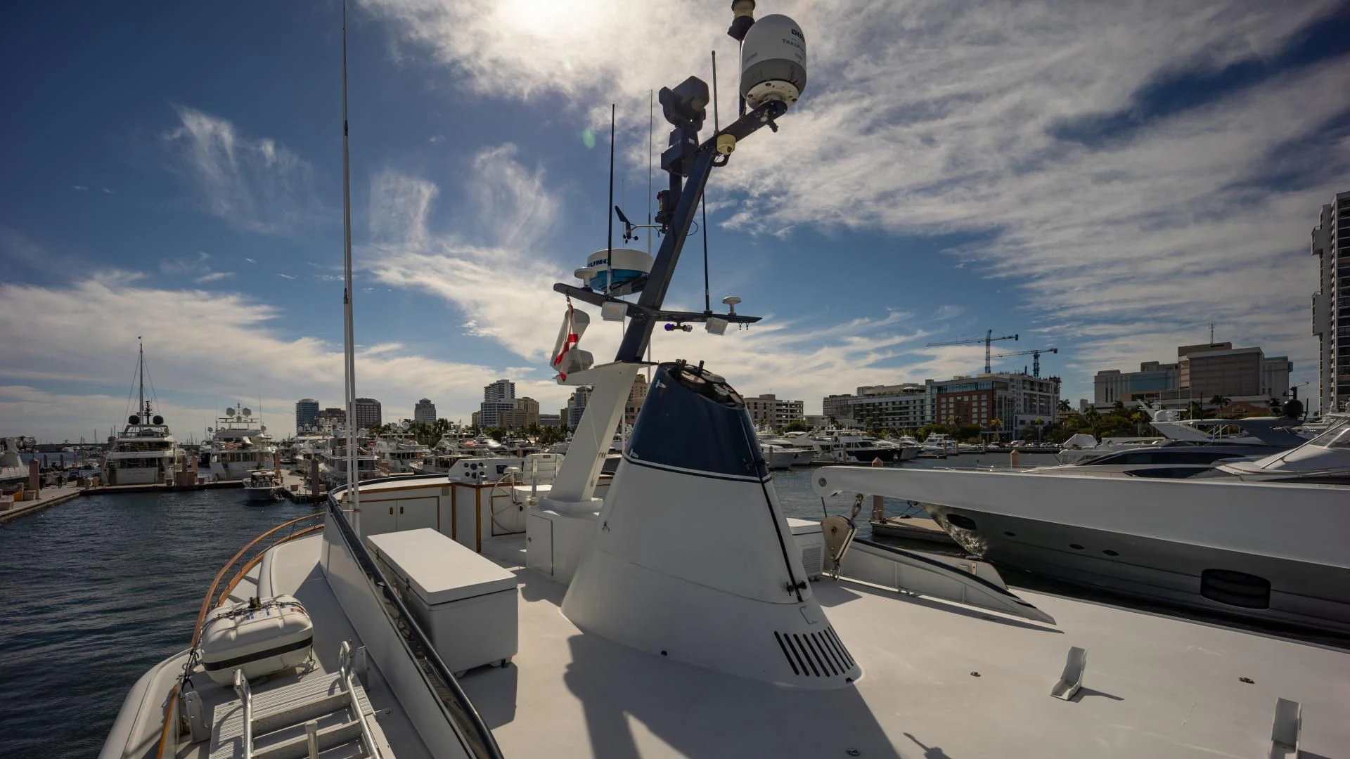 a boat docked at a port aboard SEA CZAR Yacht for Sale