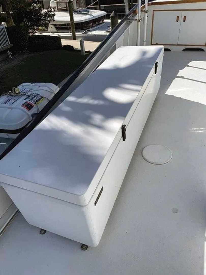 a white rectangular object with a black handle on a white surface aboard SEA CZAR Yacht for Sale