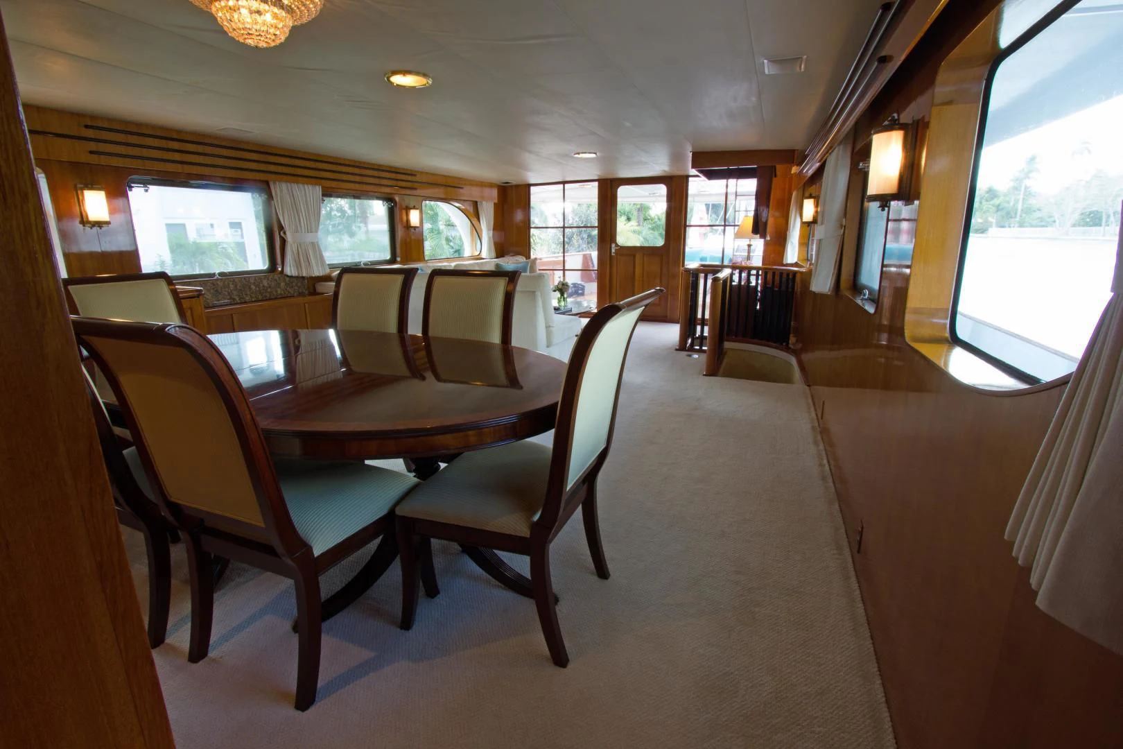 a dining room with a table aboard SEA CZAR Yacht for Sale