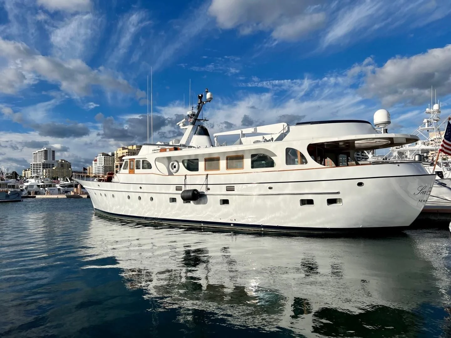 a large white boat in the water aboard SEA CZAR Yacht for Sale