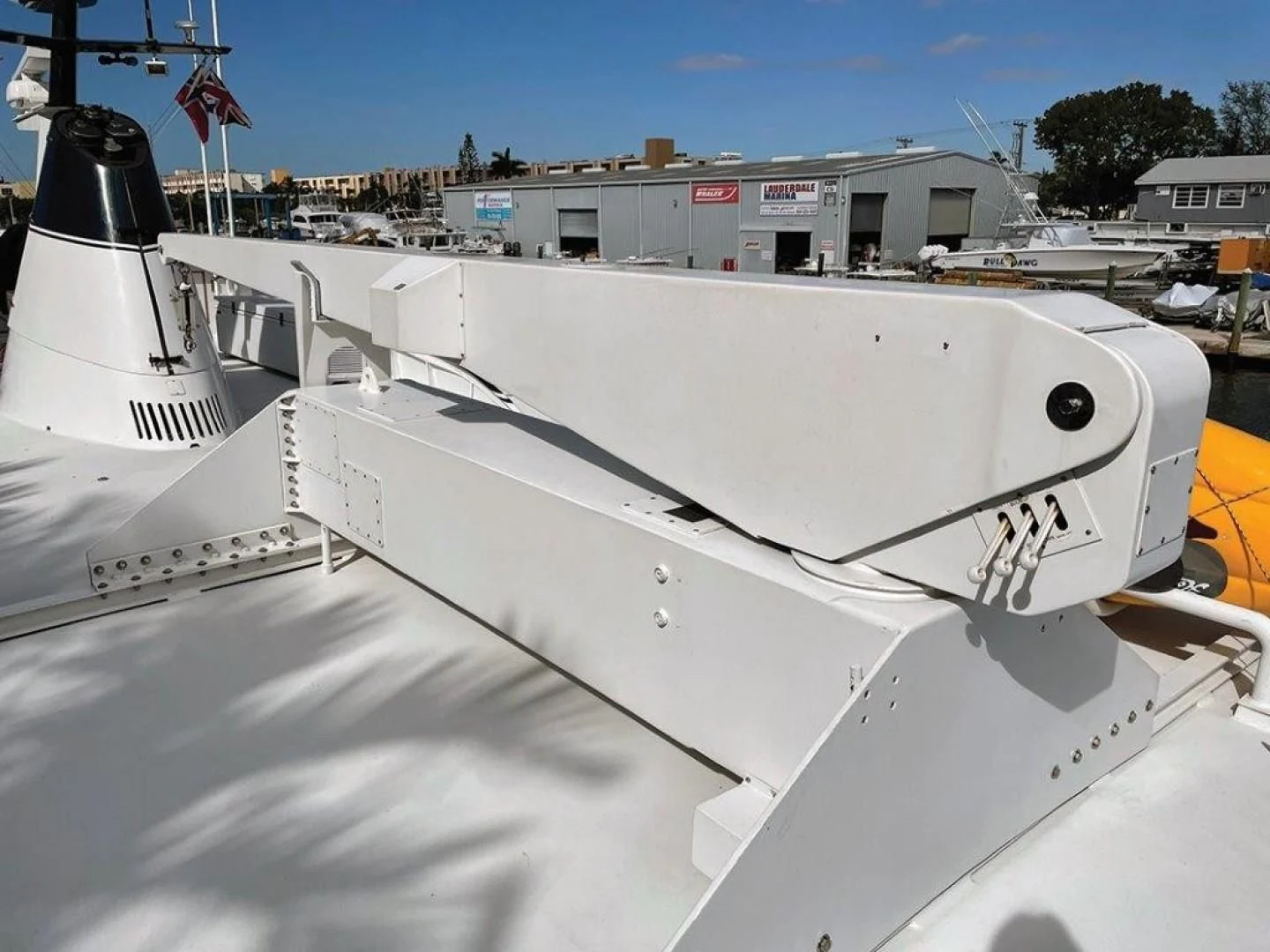 a white boat on a trailer aboard SEA CZAR Yacht for Sale