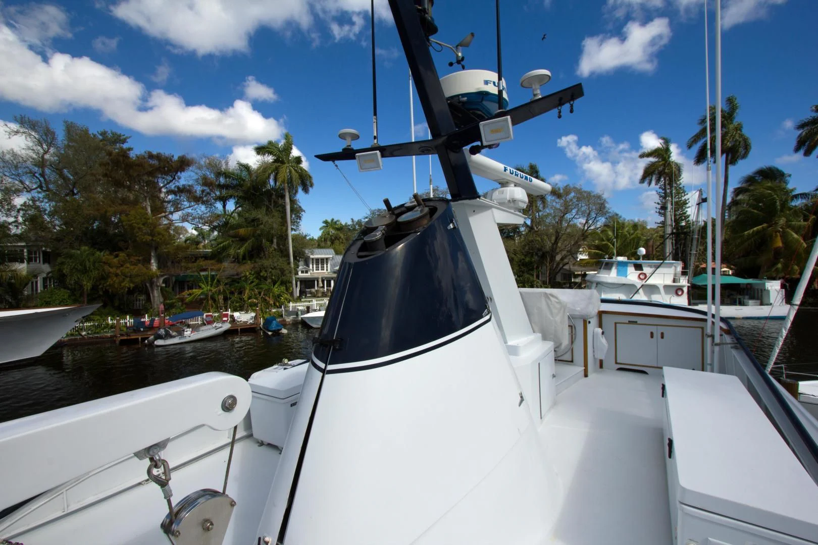 a boat docked at a pier aboard SEA CZAR Yacht for Sale