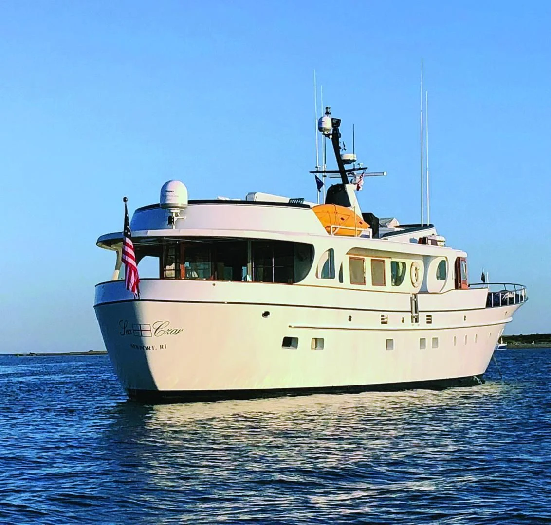 a large white boat in the water aboard SEA CZAR Yacht for Sale