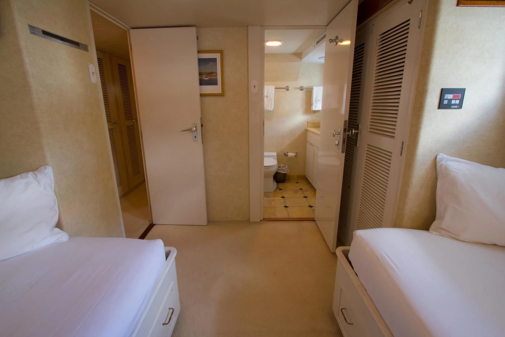 a room with a bed and a door aboard SEA CZAR Yacht for Sale