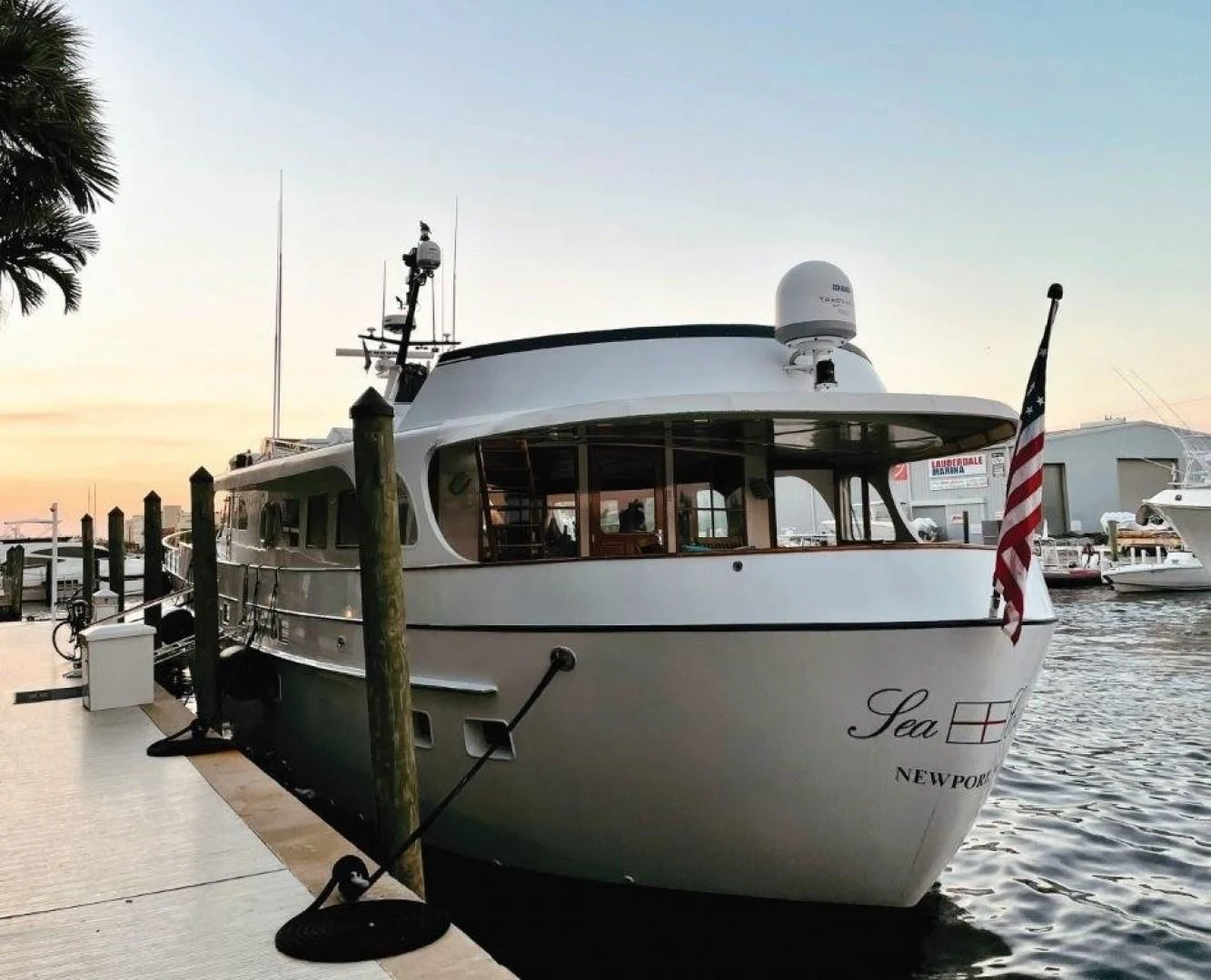 a boat docked at a pier aboard SEA CZAR Yacht for Sale