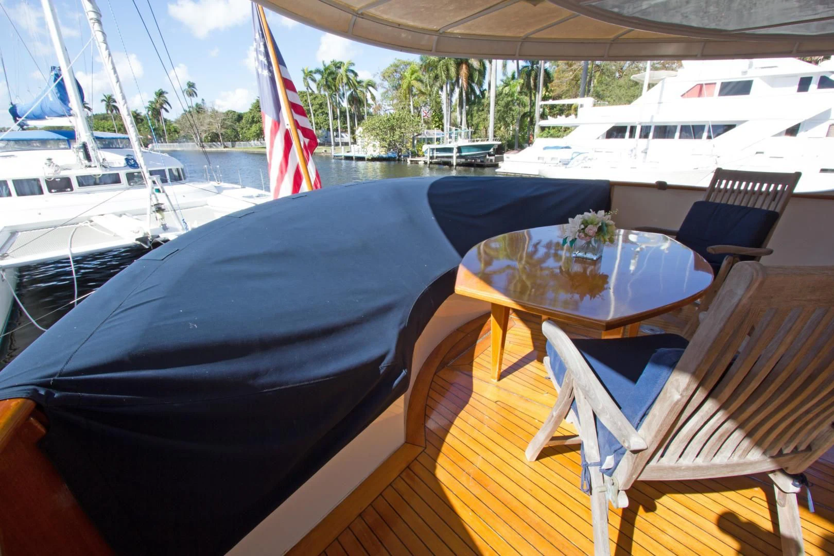 a table and chairs on a boat aboard SEA CZAR Yacht for Sale