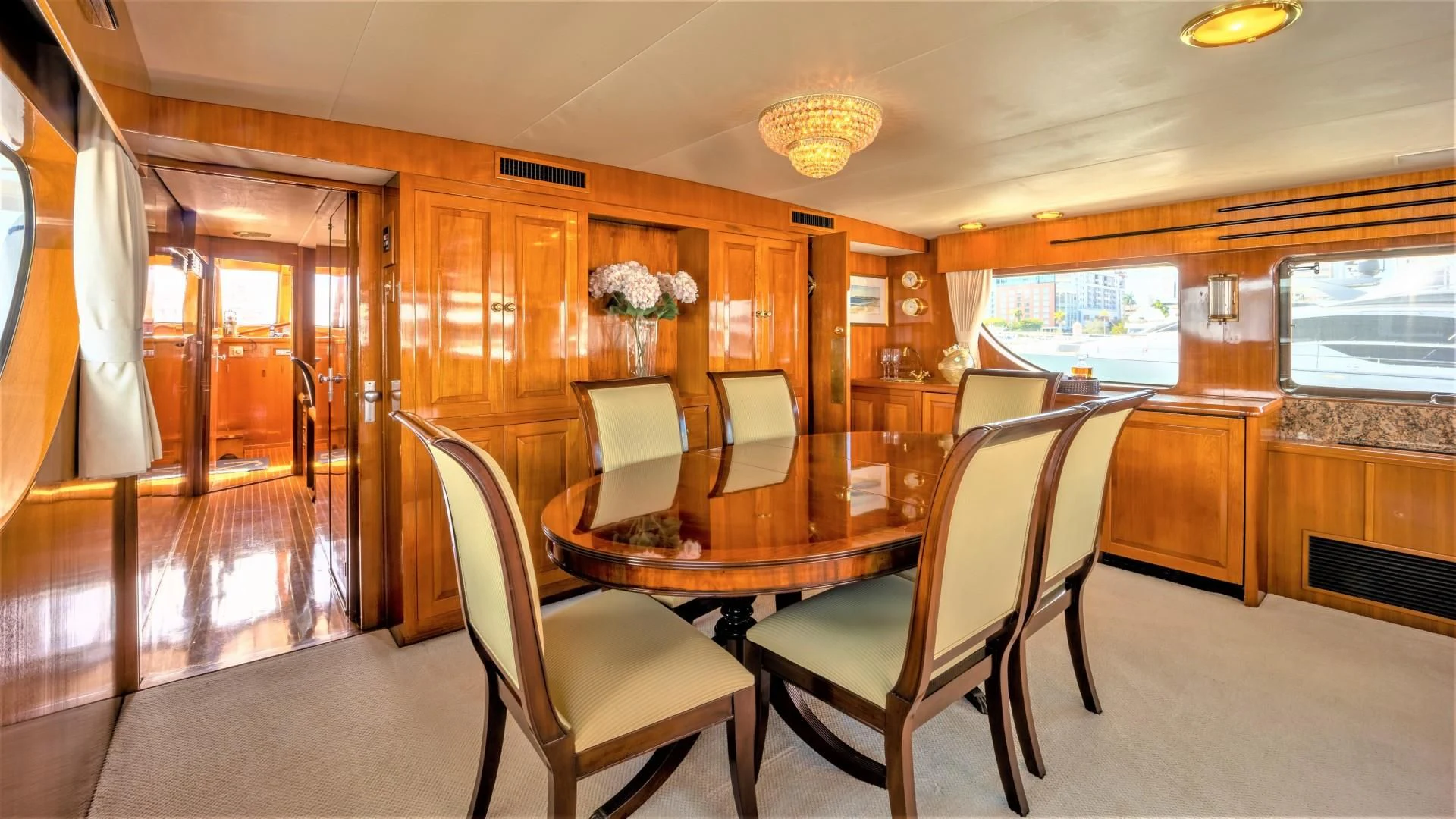 a dining room with chairs aboard SEA CZAR Yacht for Sale
