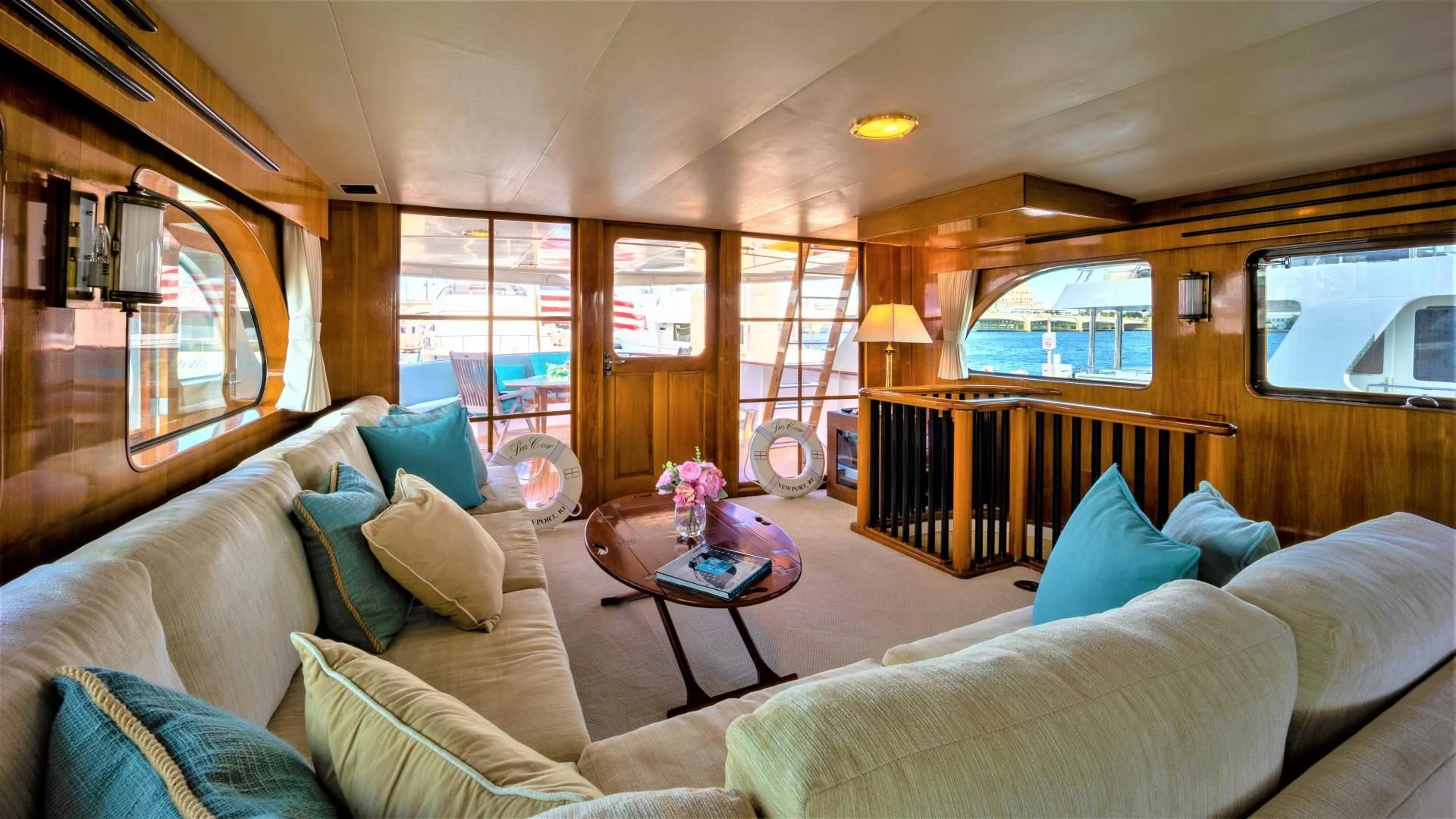 a room with a bed and a table aboard SEA CZAR Yacht for Sale