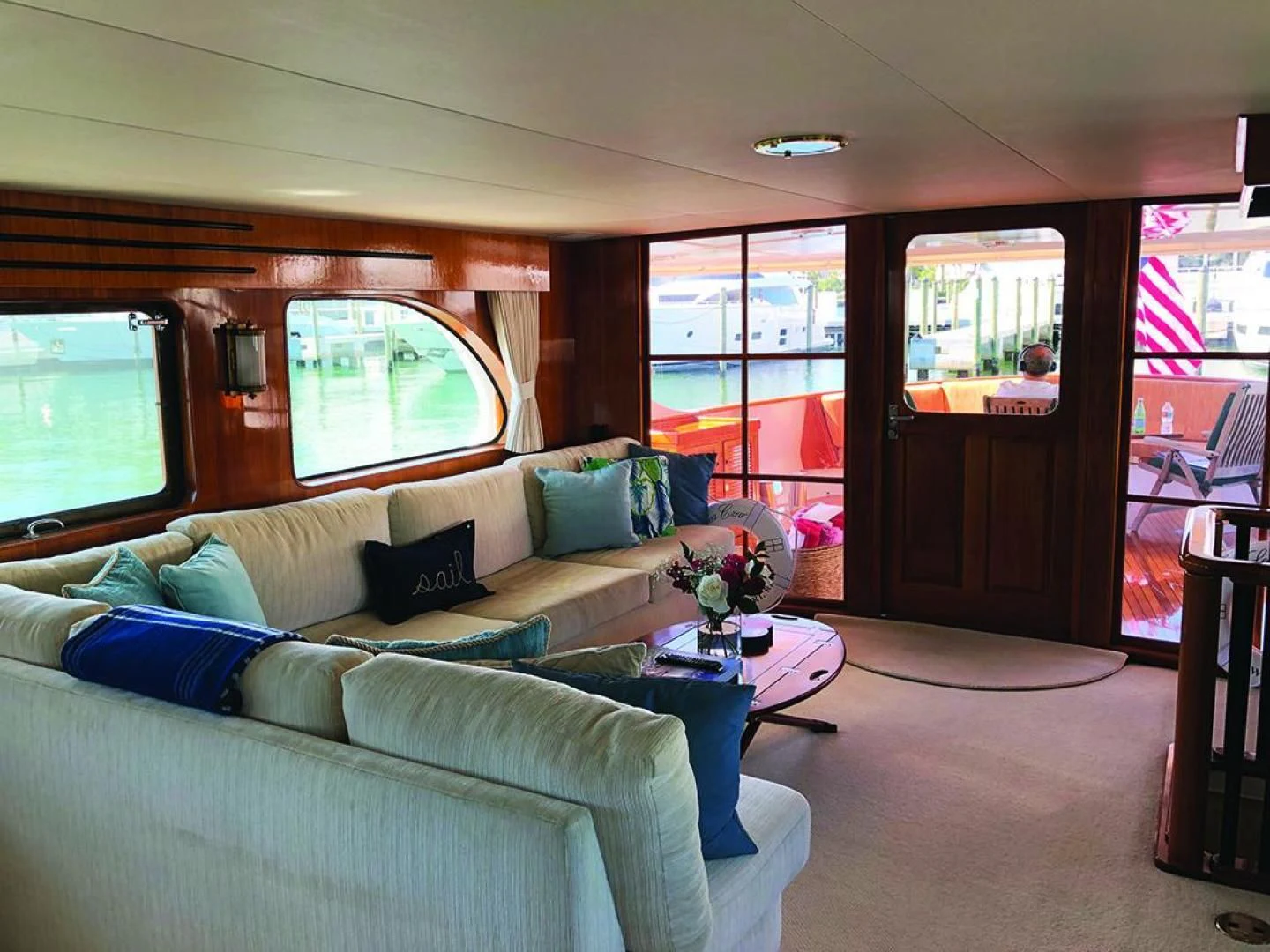 a living room with a couch and a table aboard SEA CZAR Yacht for Sale