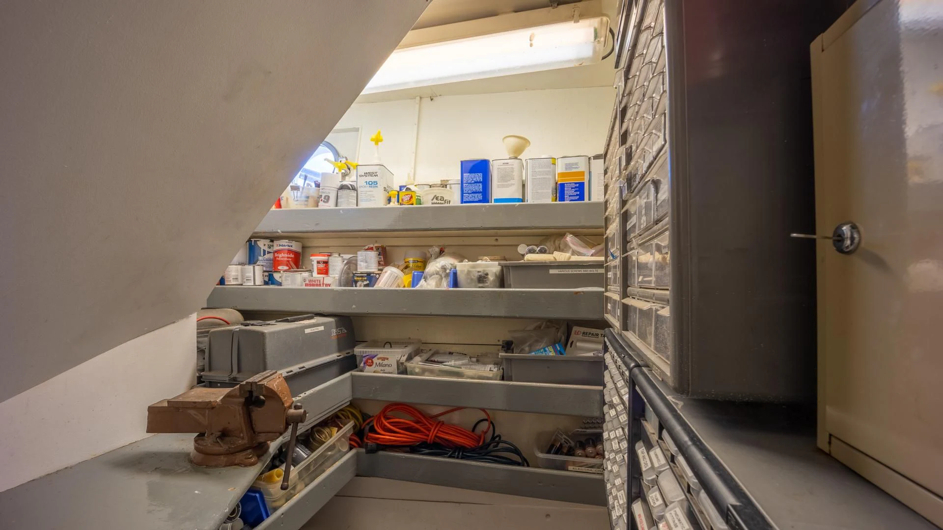 a room with shelves and items aboard SEA CZAR Yacht for Sale