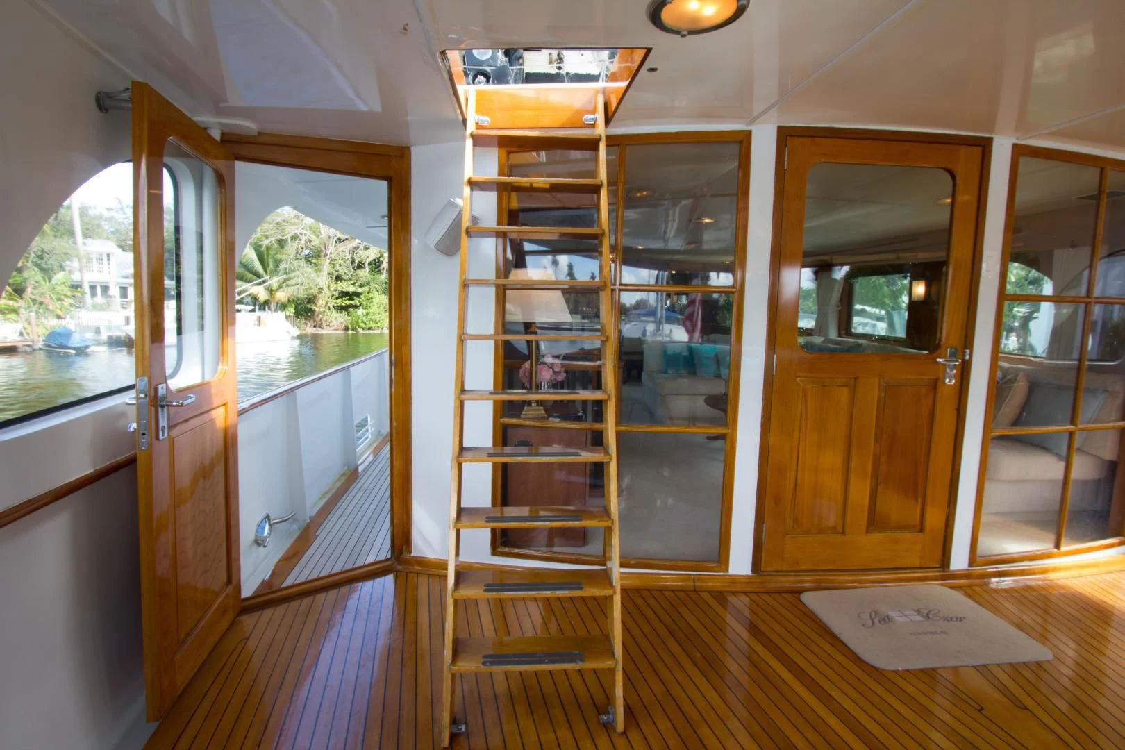 a room with wooden cabinets aboard SEA CZAR Yacht for Sale