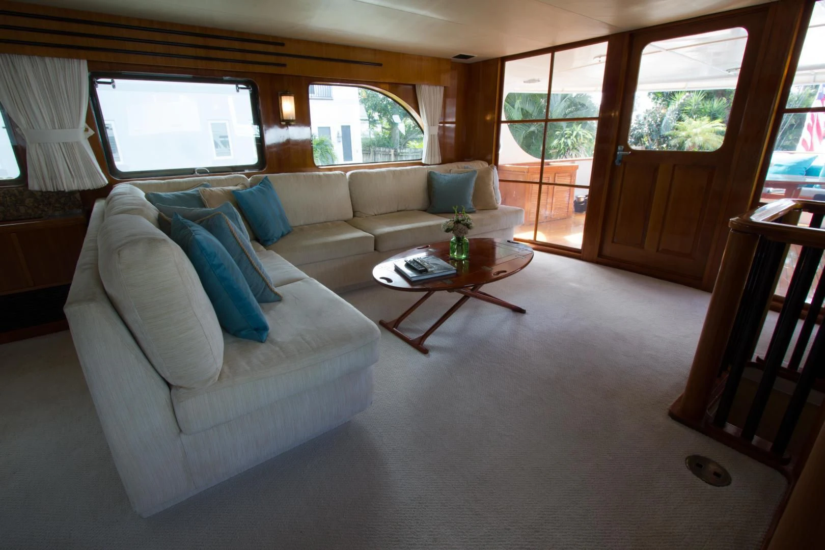 a living room with a couch and a coffee table aboard SEA CZAR Yacht for Sale