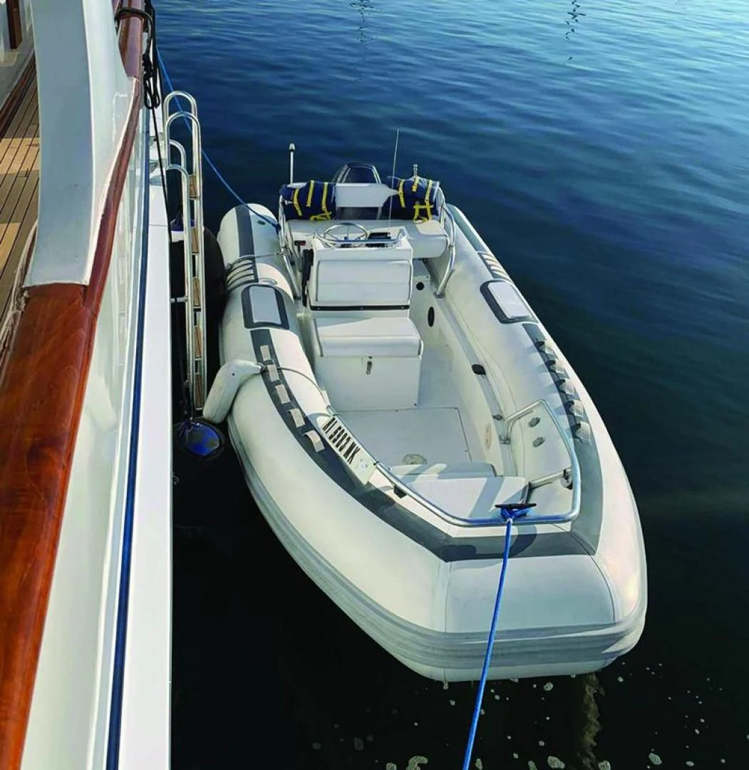 a boat docked at a pier aboard SEA CZAR Yacht for Sale