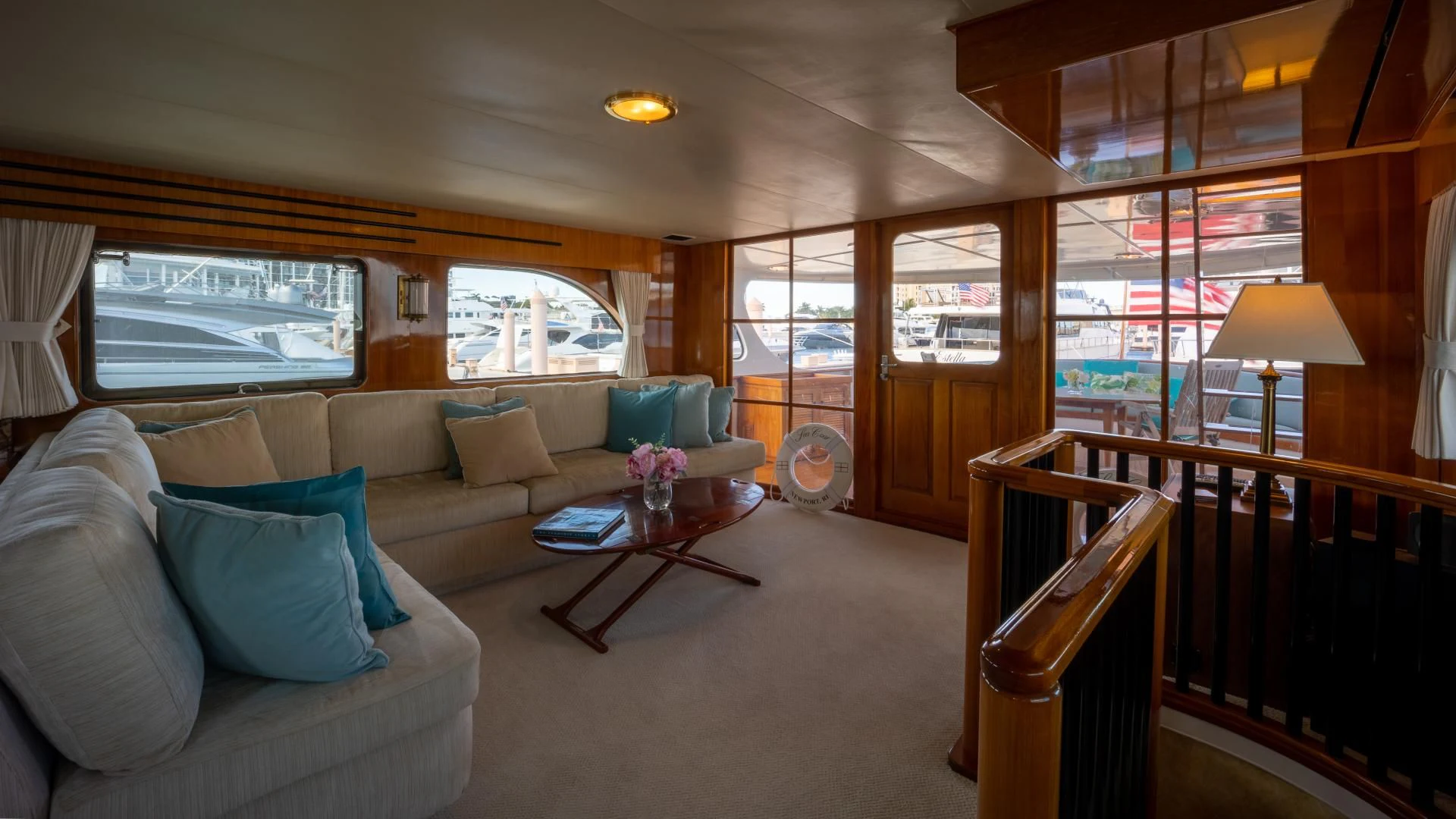 a living room with a couch and a table aboard SEA CZAR Yacht for Sale