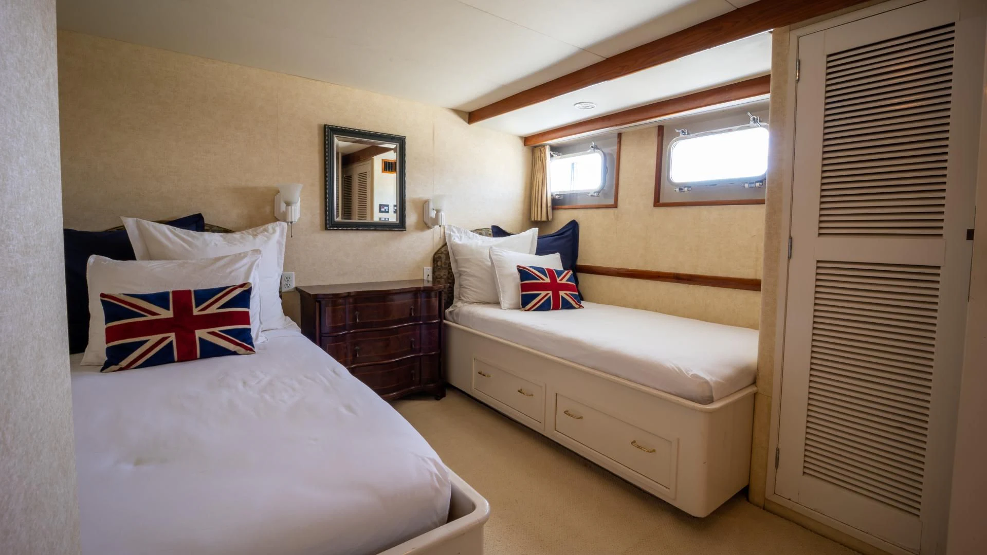a room with two beds aboard SEA CZAR Yacht for Sale