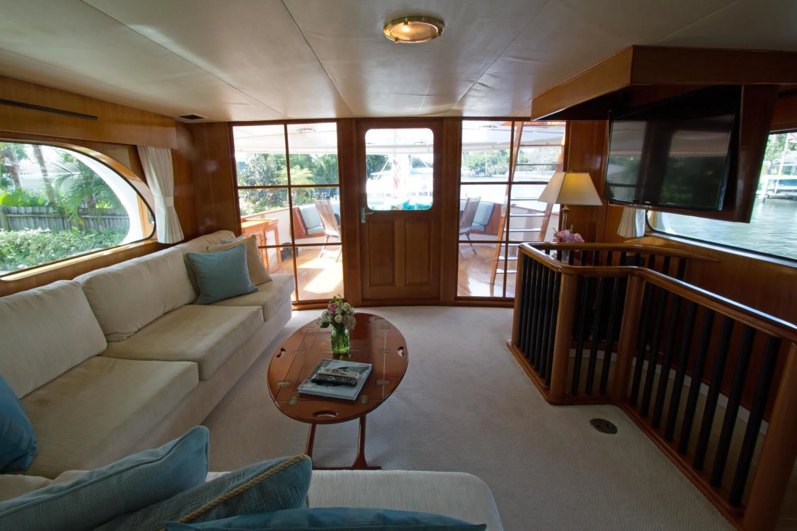 a living room with a couch and a table aboard SEA CZAR Yacht for Sale