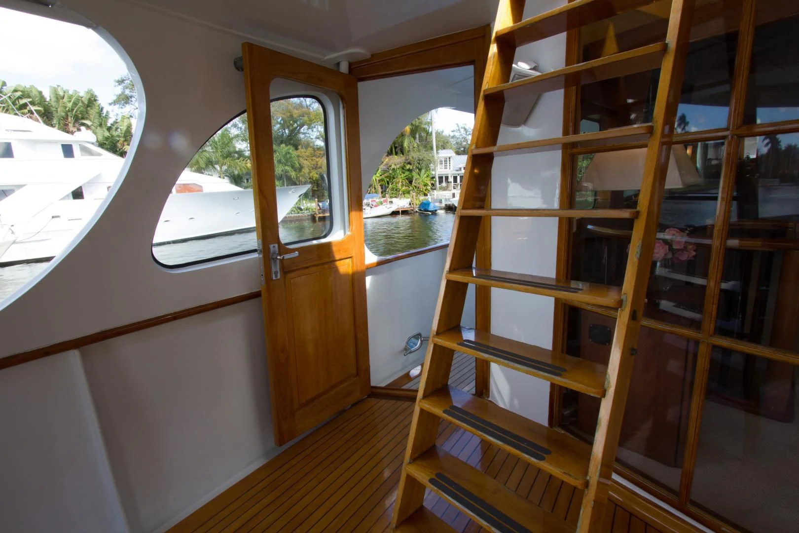 a wooden bunk bed in a room aboard SEA CZAR Yacht for Sale