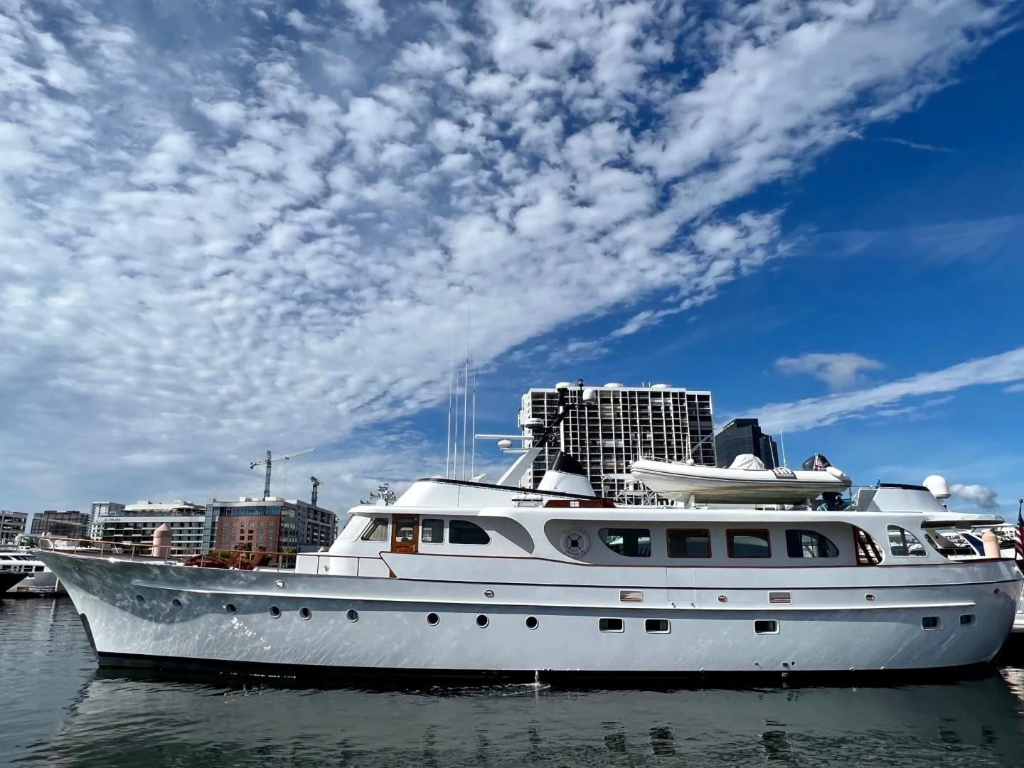 a large white boat in the water aboard SEA CZAR Yacht for Sale