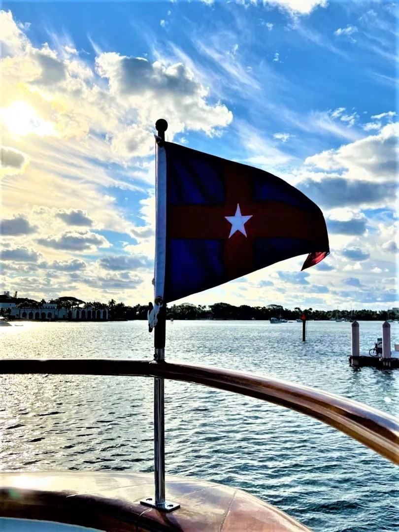 a flag on a pole aboard SEA CZAR Yacht for Sale
