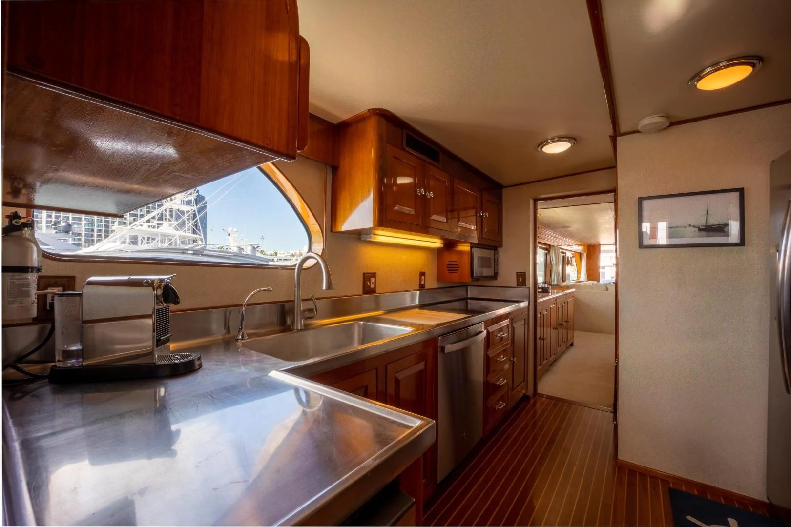 a kitchen with a large island aboard SEA CZAR Yacht for Sale