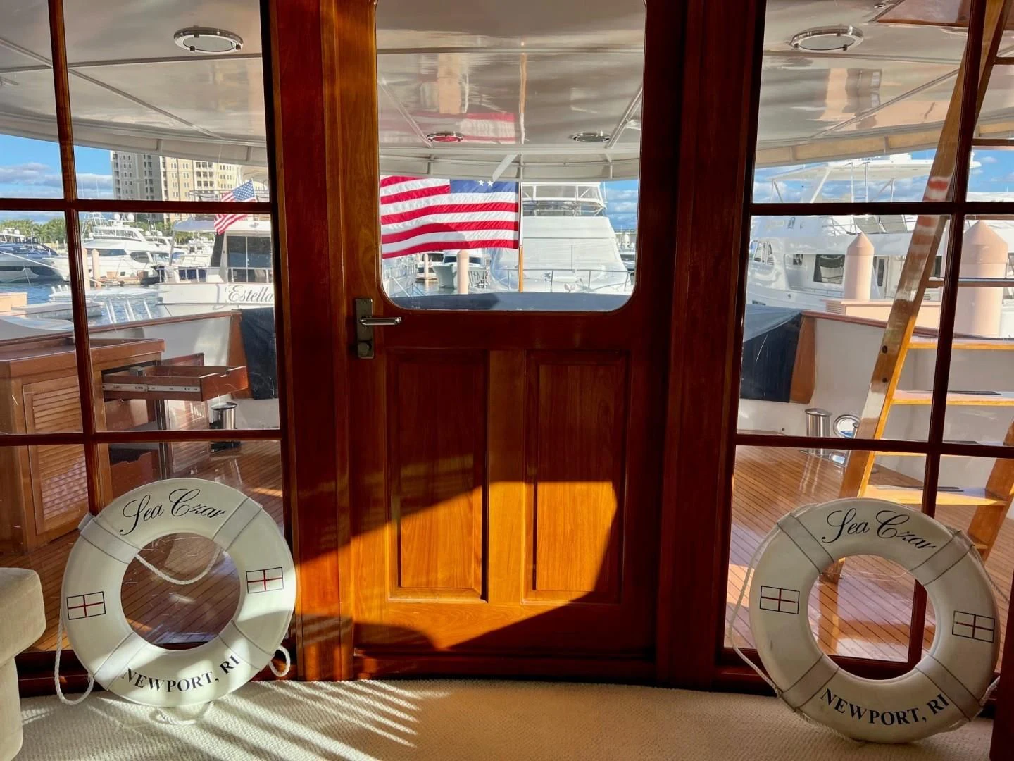 a clock in a glass case aboard SEA CZAR Yacht for Sale