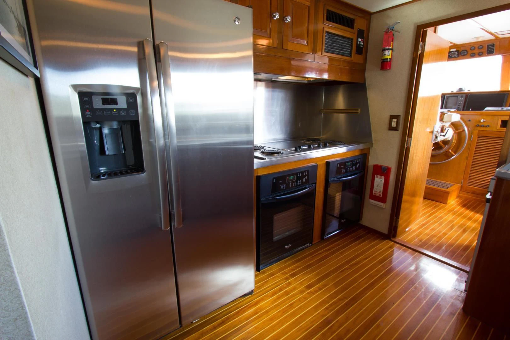 a kitchen with stainless steel appliances aboard SEA CZAR Yacht for Sale